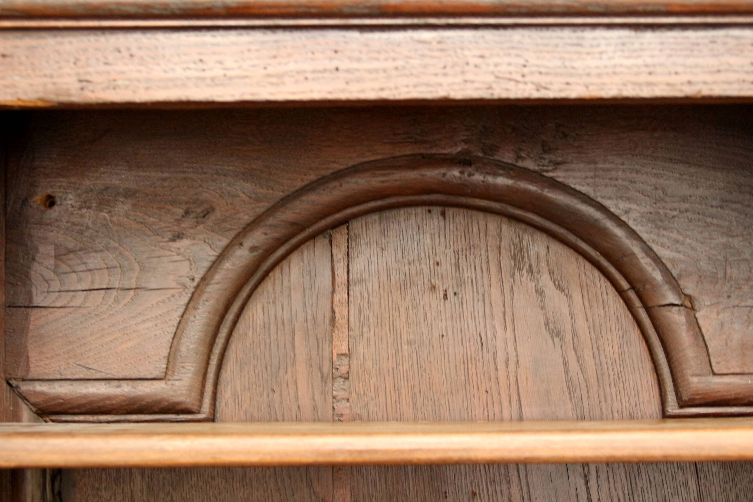 Elegant 18th century solid oak display cabinet.