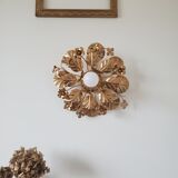 Golden metal flower sconces