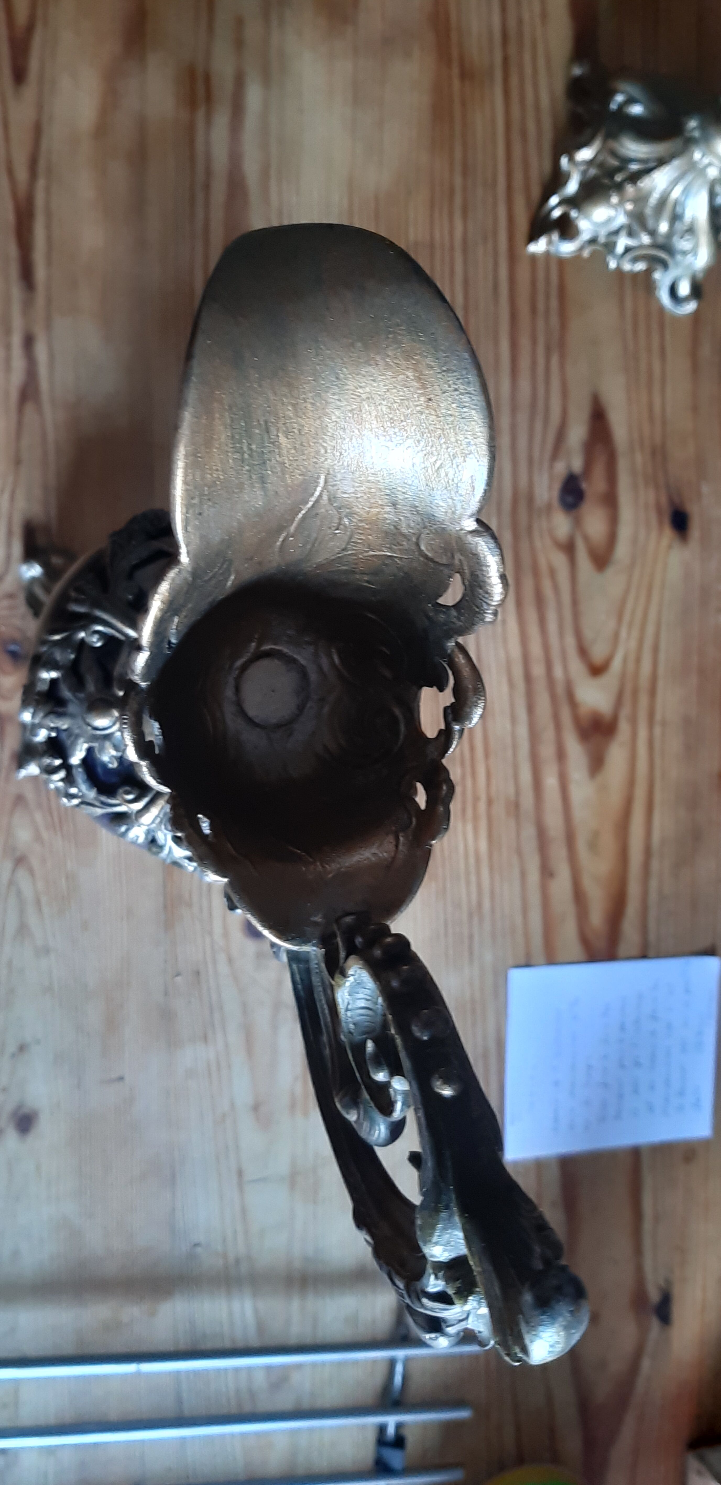 Pair of golden regulated ewers and blue glass