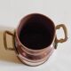 Small copper milk jug