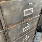 Metal furniture with 15 renovated roneo flaps.
