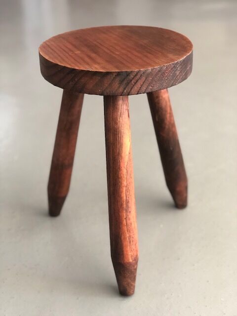 Pair of dyed wooden milking stools