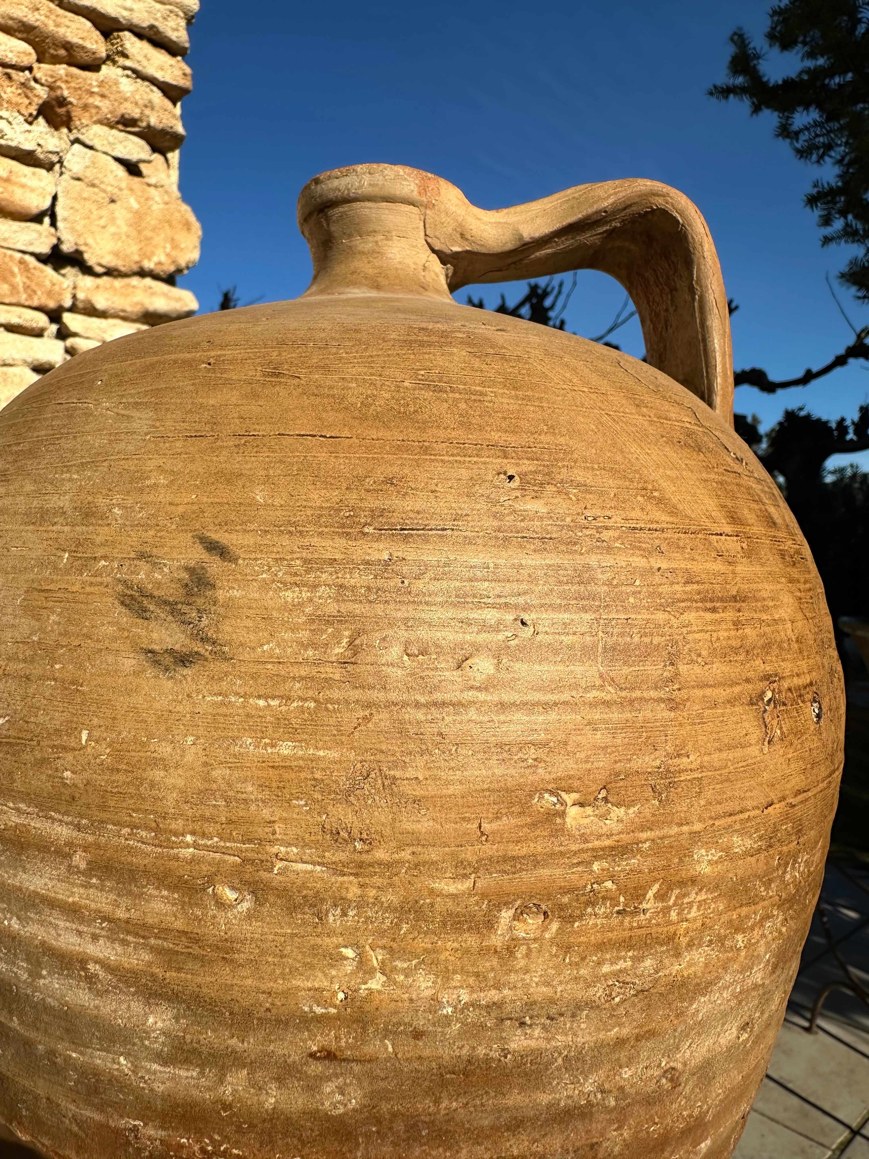Ancient 19th-century terracotta jug
