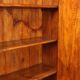 Vintage walnut wardrobe with exposed hardware.