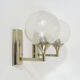 Pair of chrome metal wall sconces and blown glass