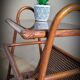 Braided rattan side table and smoked glass