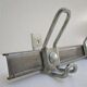 Vintage school wall rack in patinated steel