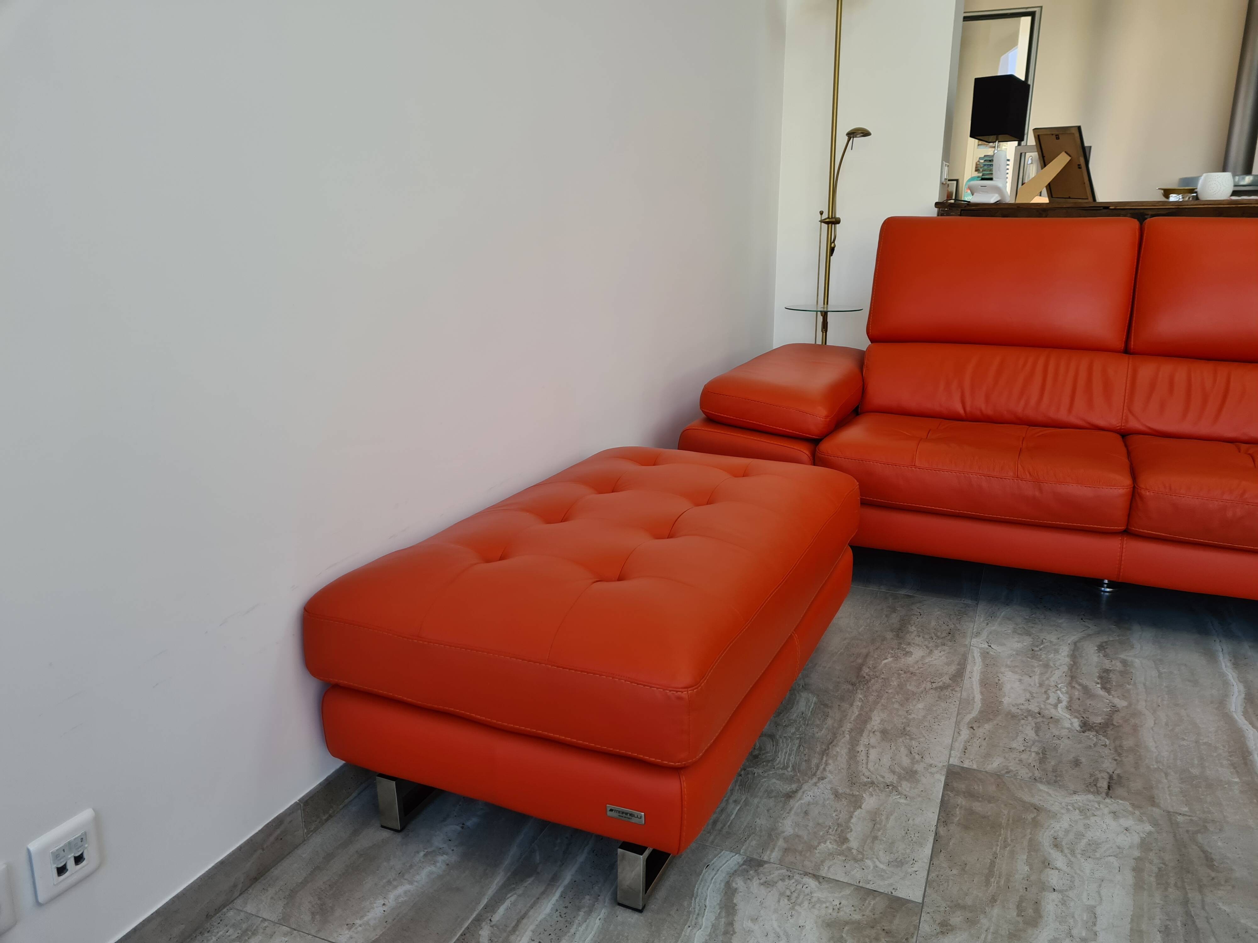 Orange leather pouf