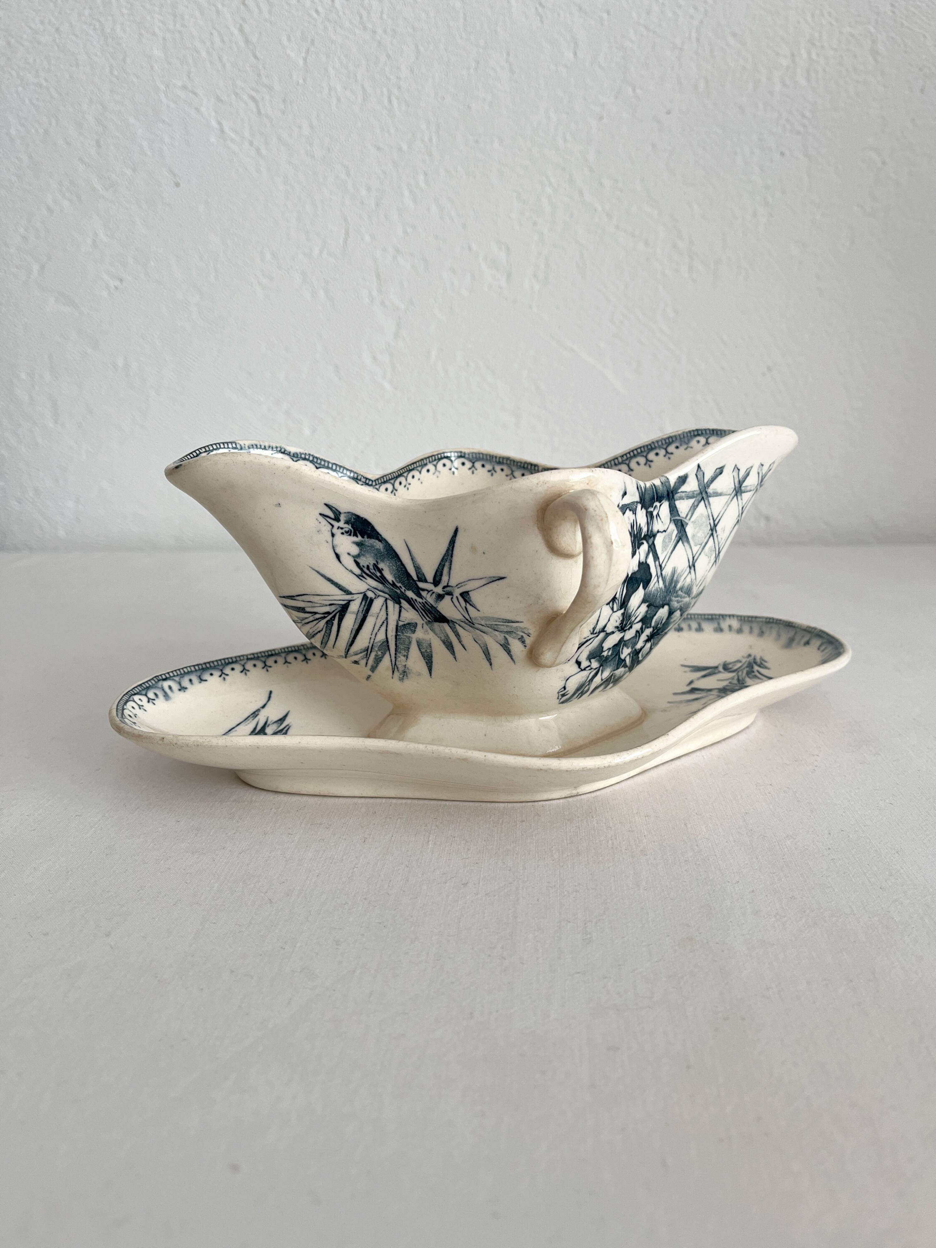 Antique iron earthenware sauceboat with flowers and birds "Malaga" Petrus Regout