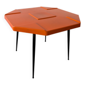 Orange fibreglass table from the 1970s, space age style.