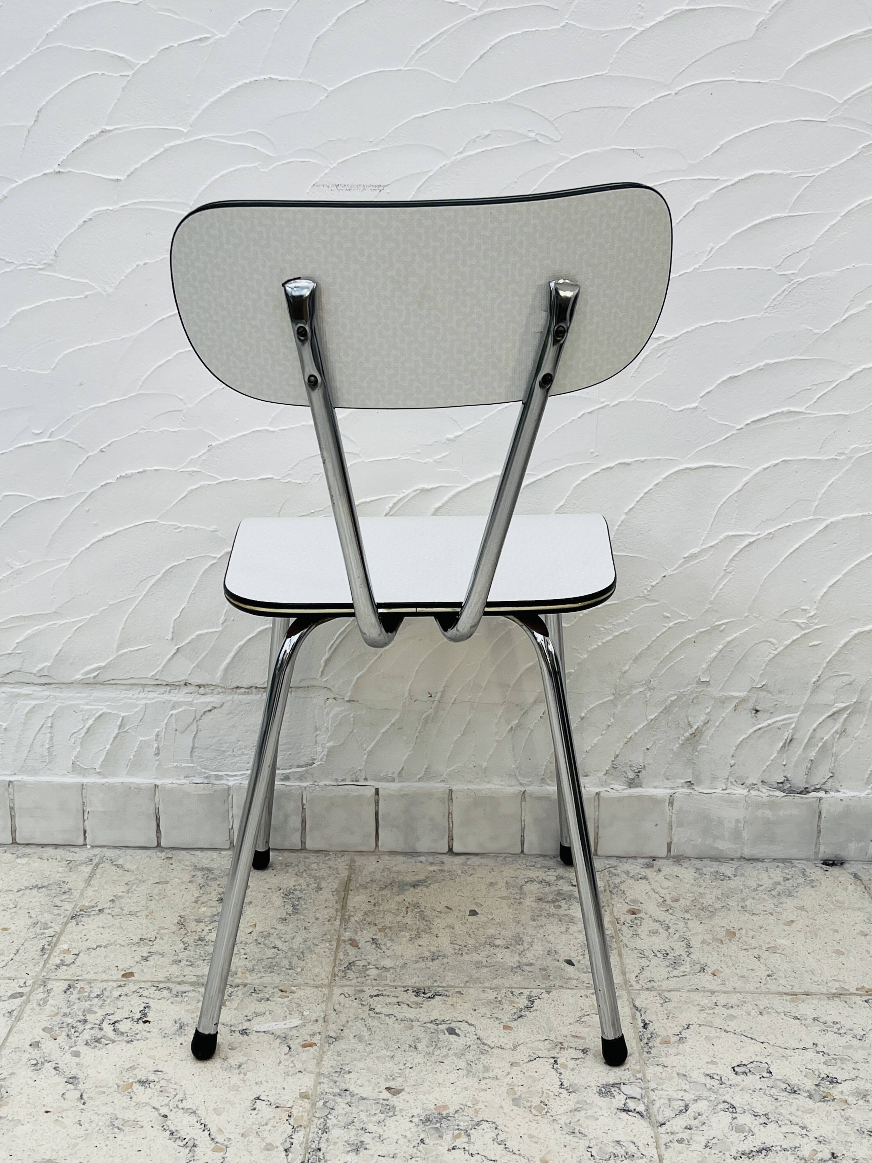 Set of 4 vintage grey chrome Formica kitchen chairs.