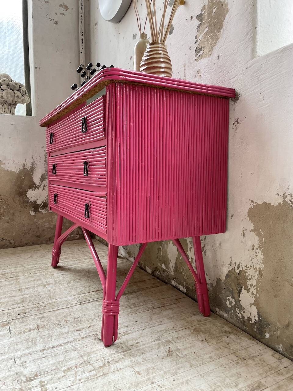 Vintage pink rattan chest of drawers