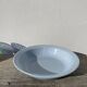 Round, flat, sky-blue ceramic salad bowl from Moulin des Loups