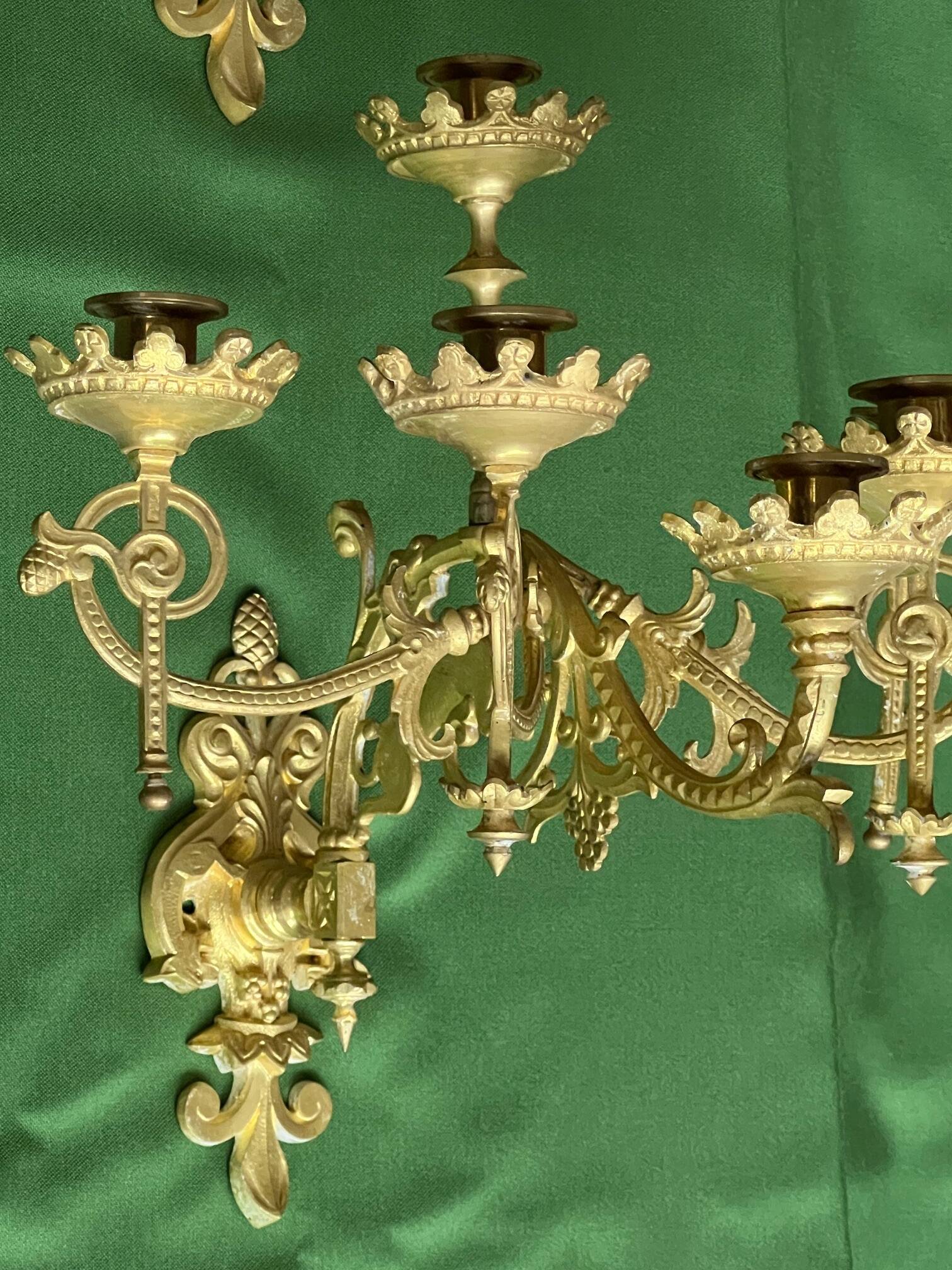 Pair of neo-Gothic wall sconces. Solid gilt bronze.