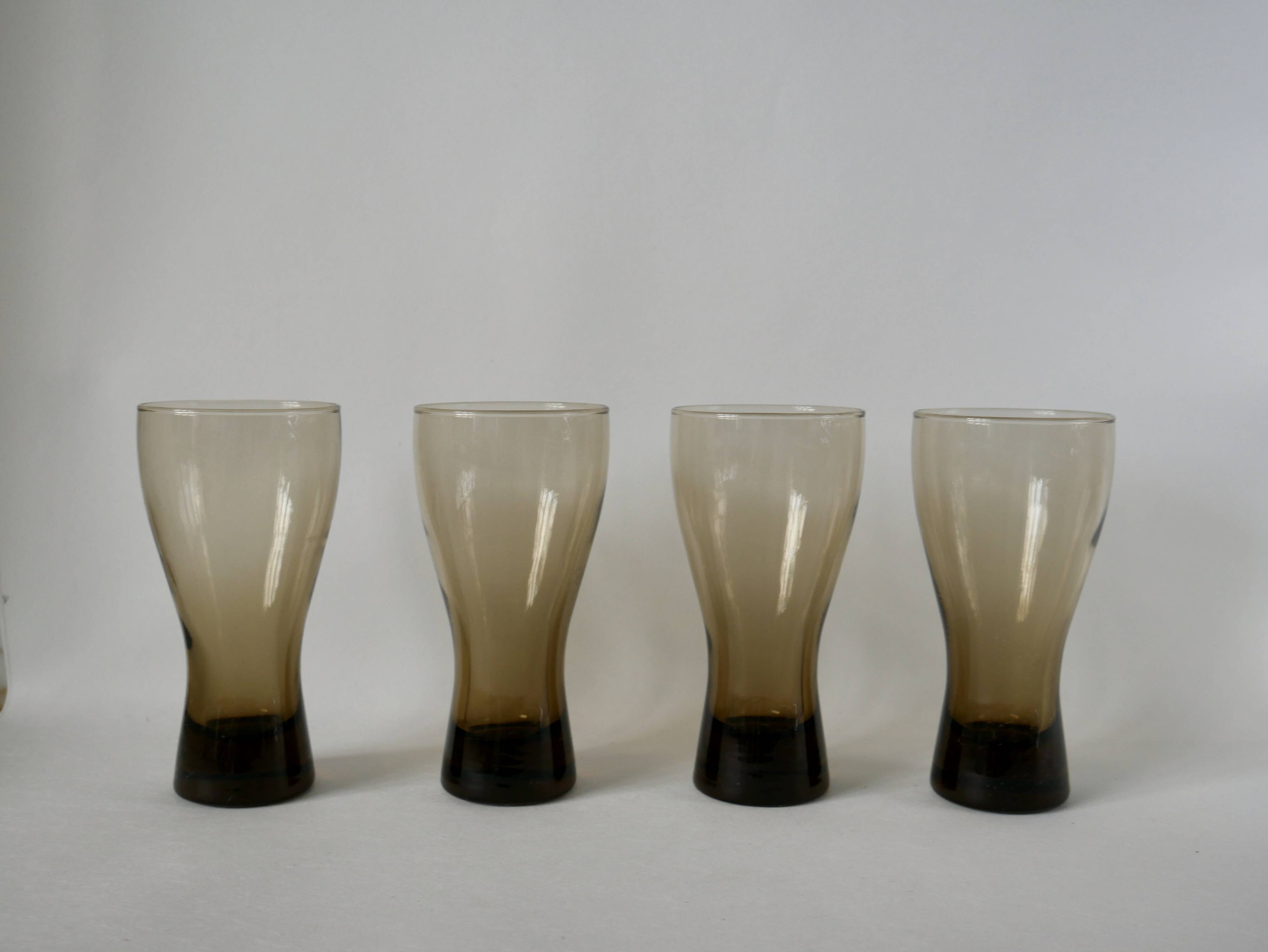 Set of 4 glasses in smoked glass and thick bottom from the 70s