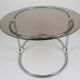 ​Table à manger en métal chromé et verre fumé