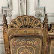 Pair of corner armchairs and an Orientalist bench in carved and polychrome wood from around 1900.