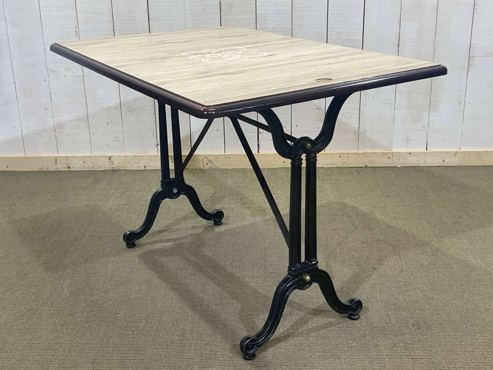 Bistro table - modern work, cast iron base