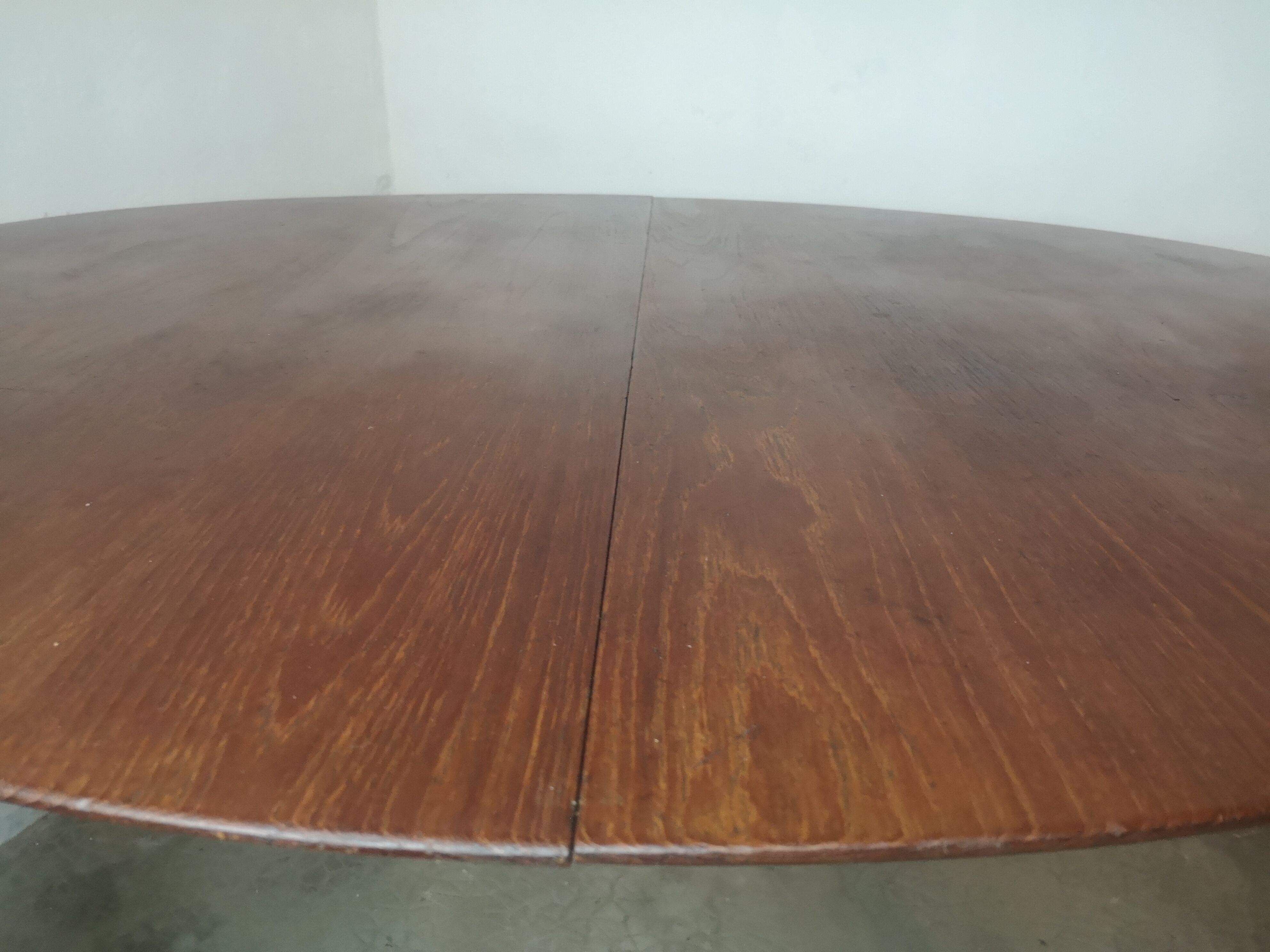 Scandinavian extendable round dining table in teak