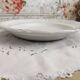 Niderviller hollow round dish in white earthenware bordered gold