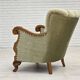 Fauteuil danois des années 1960, velours vert, bois de chêne sculpté.