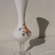 Vase en verre fleuri fleur orange sur pied