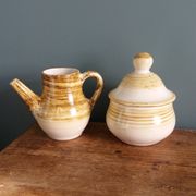 Sugar bowl and milk jug in Longchamp earthenware.