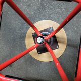 Red stool with industrial vintage screw 80s