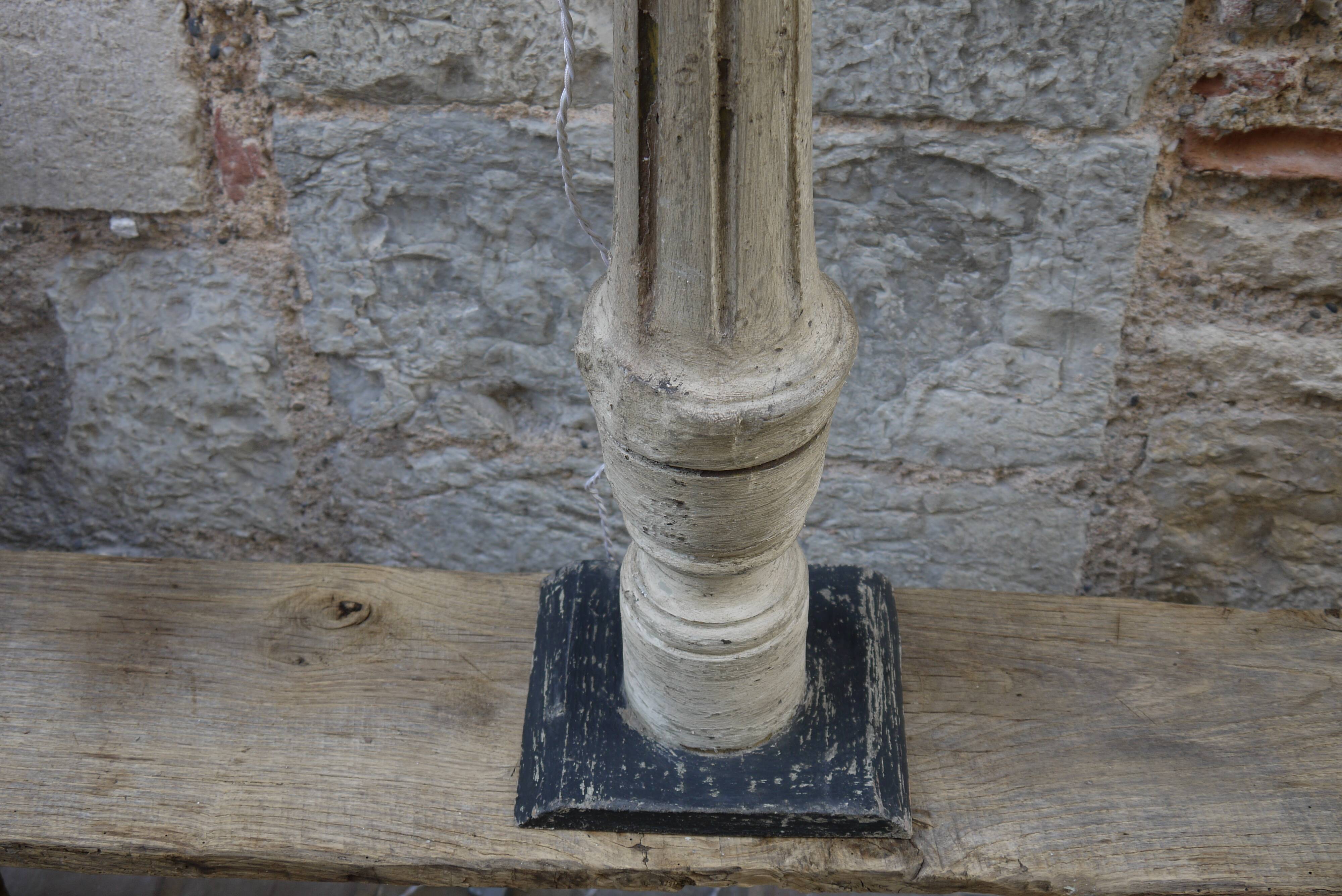 Baluster lamp foot in patinated wood