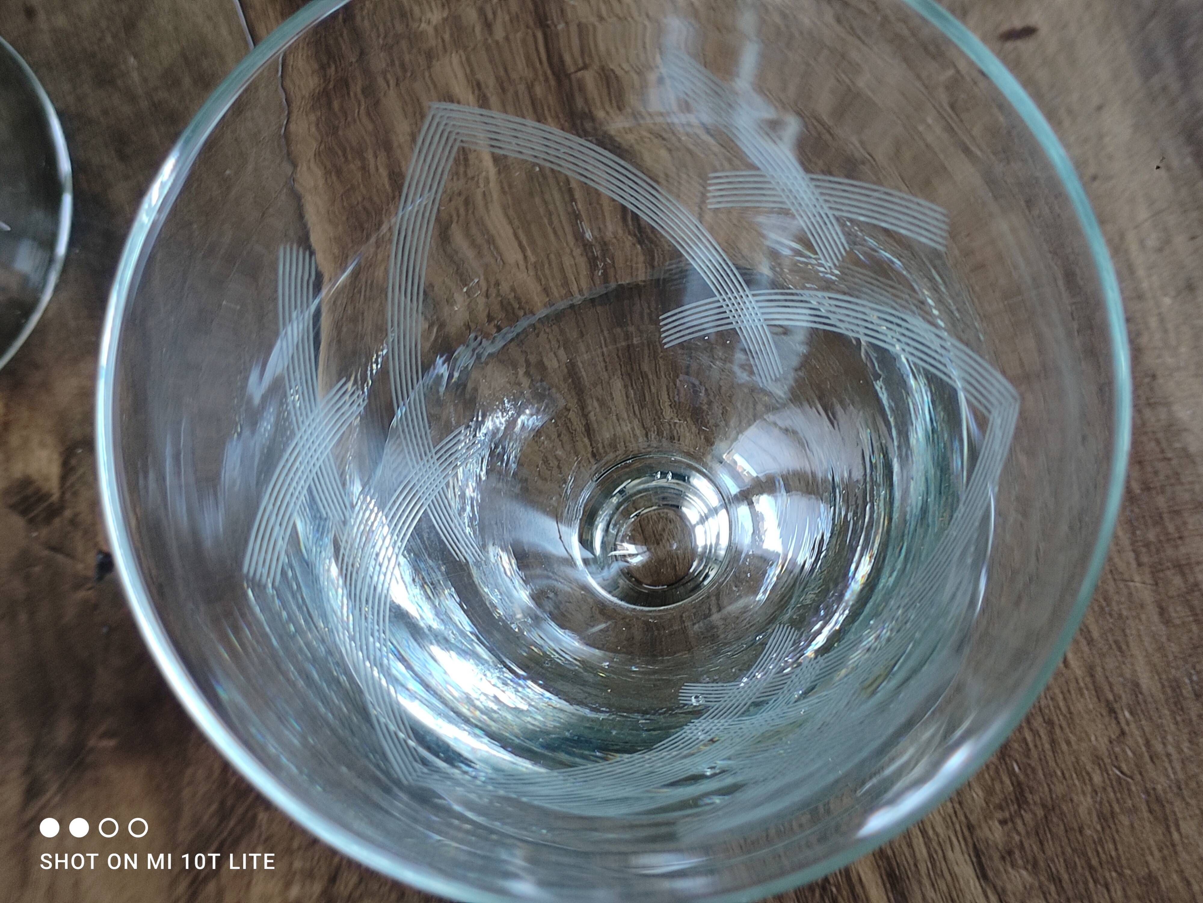 Set of 9 conical glasses on pedestal in antique chiseled glass crosses
