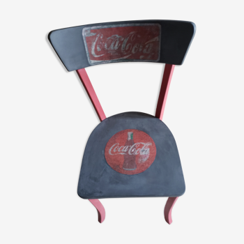 Former wooden bistro chair redesigned "Coca Cola"