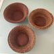 Trio of vintage woven rattan and wicker baskets