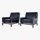Pair of 50s-60s armchairs in imitation leather, wood and chrome
