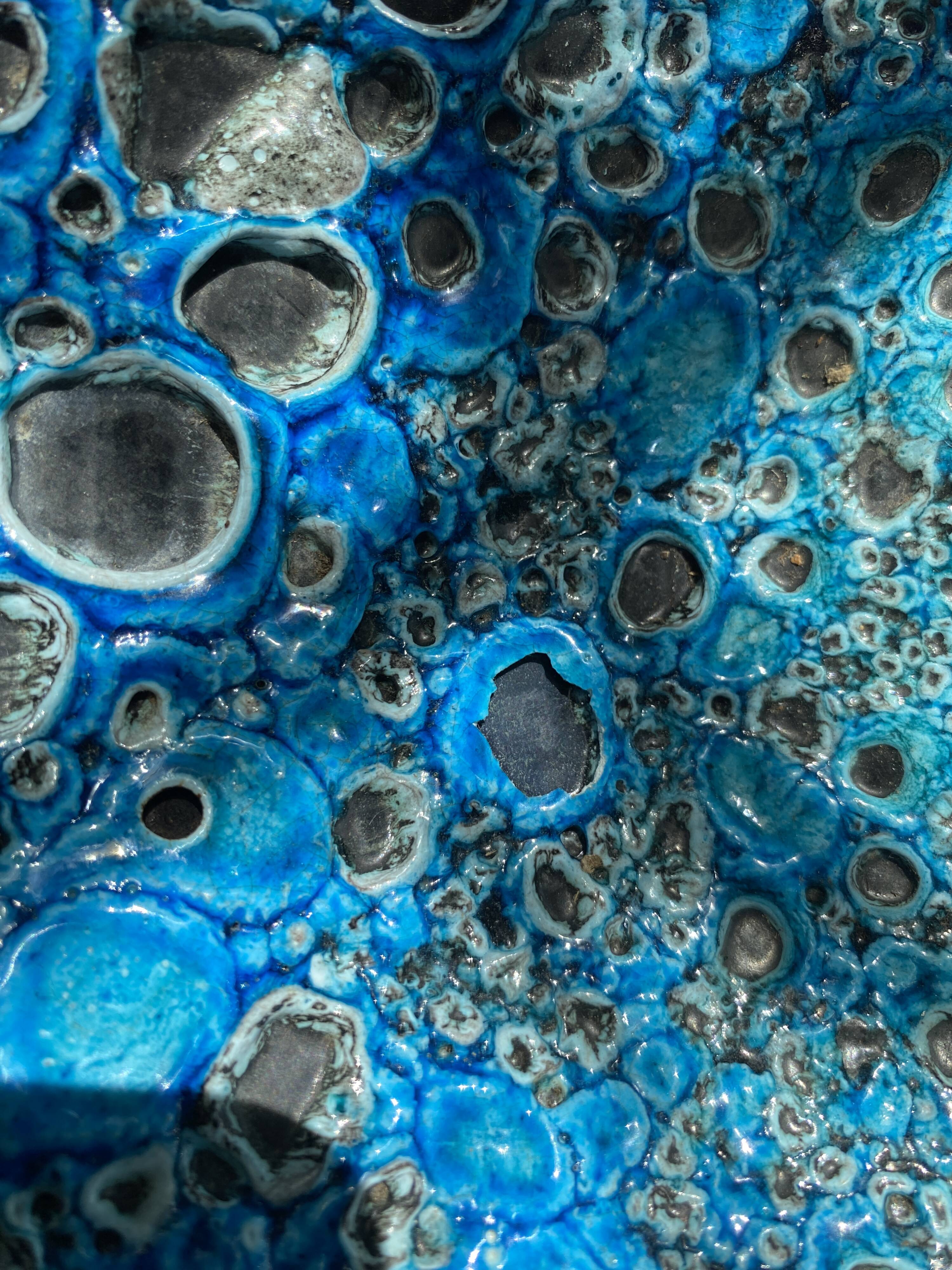 Eruptive ceramic dish from the 60s