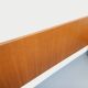 Double bed in vintage Scandinavian style from the 1960s with bedside tables.