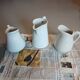 3 small antique porcelain pitchers/milk pots