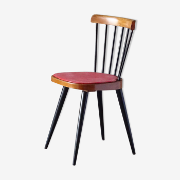 Baumann chair in red skai with 1960s coffee table legs