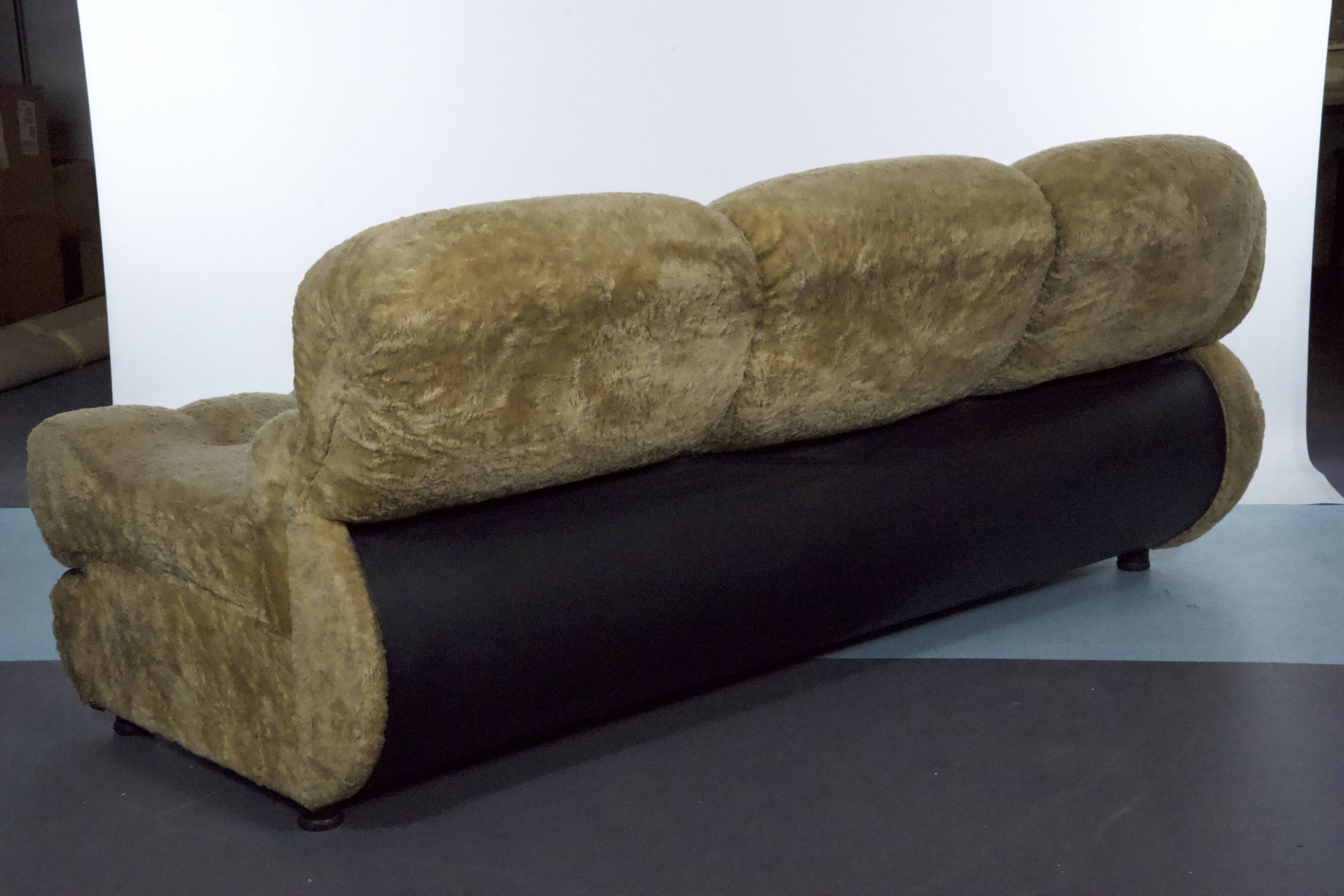 three-seater sofa designed by Adriano Piazzesi, produced in Italy during the 1970s. Upholster