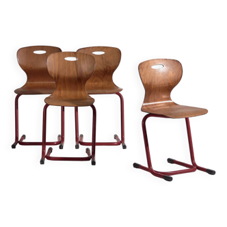 4 chaises en métal rouge, vers 1950