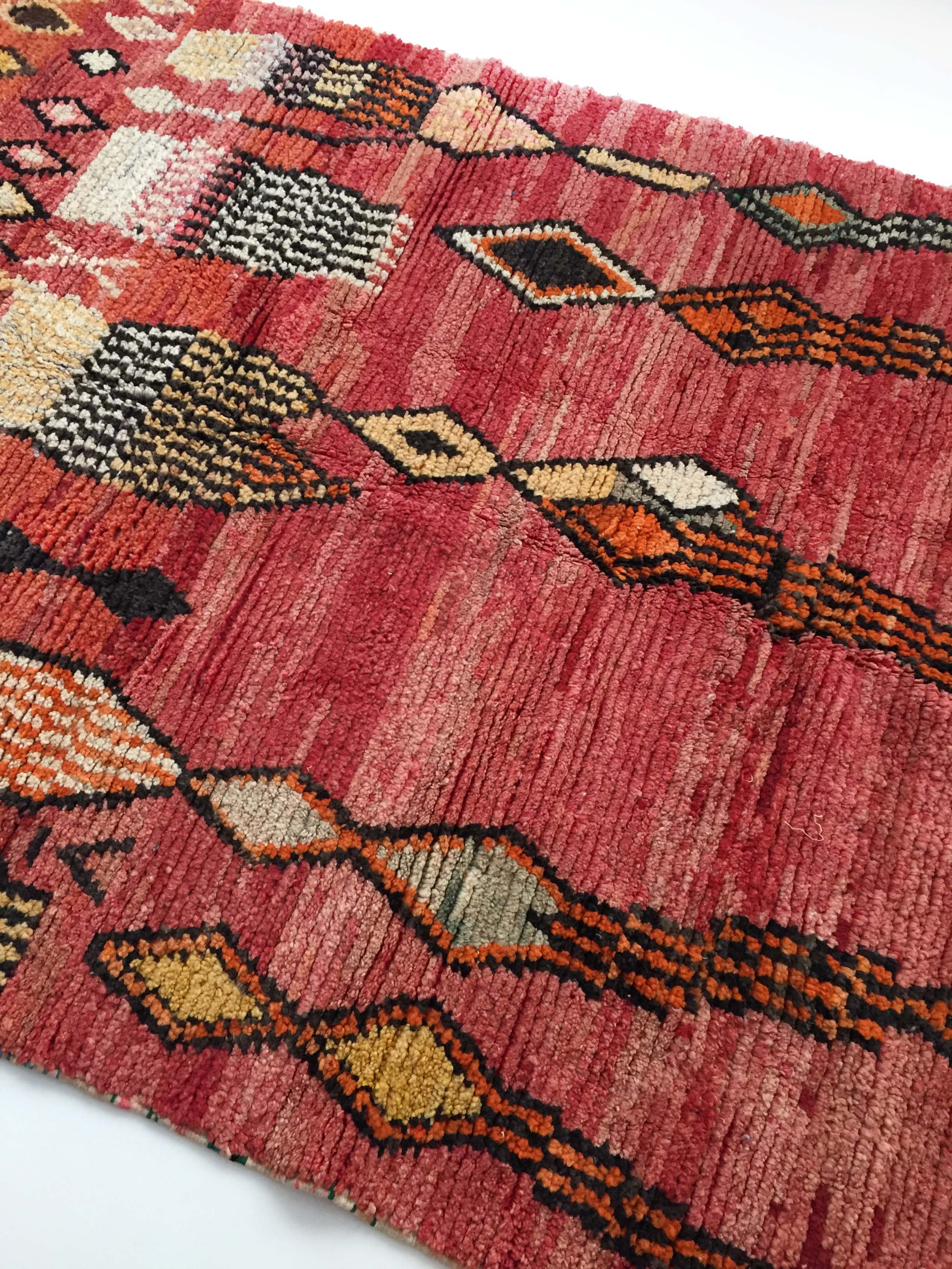 Moroccan Berber carpet Boujaad red with colorful patterns 252x158cm