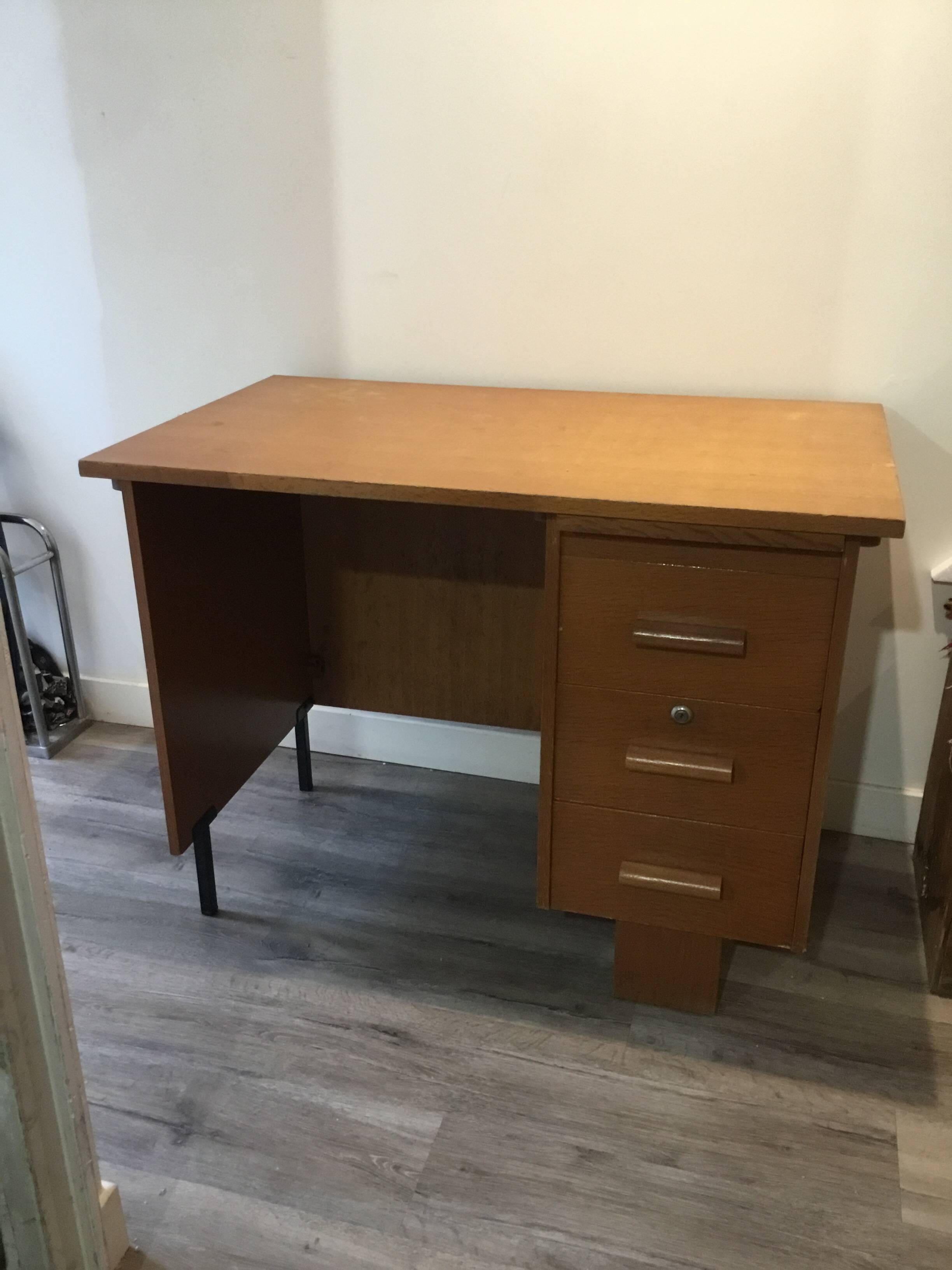 wood and metal desk from the 1960s in modernist style