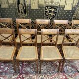 Suite de 9 chaises en cannage de style Empire - Consulat