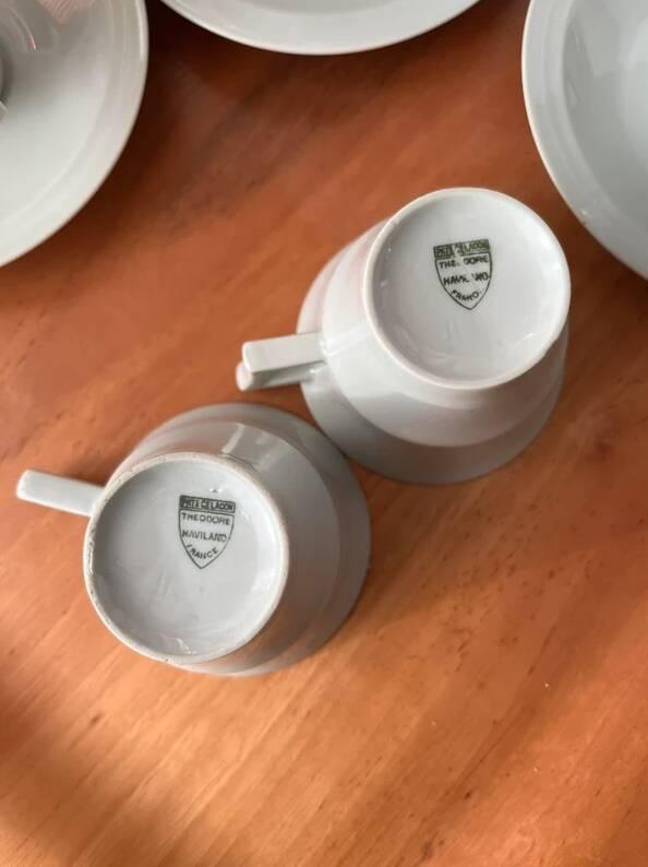 Art Deco cups and saucers by Théodore Haviland in celadon.