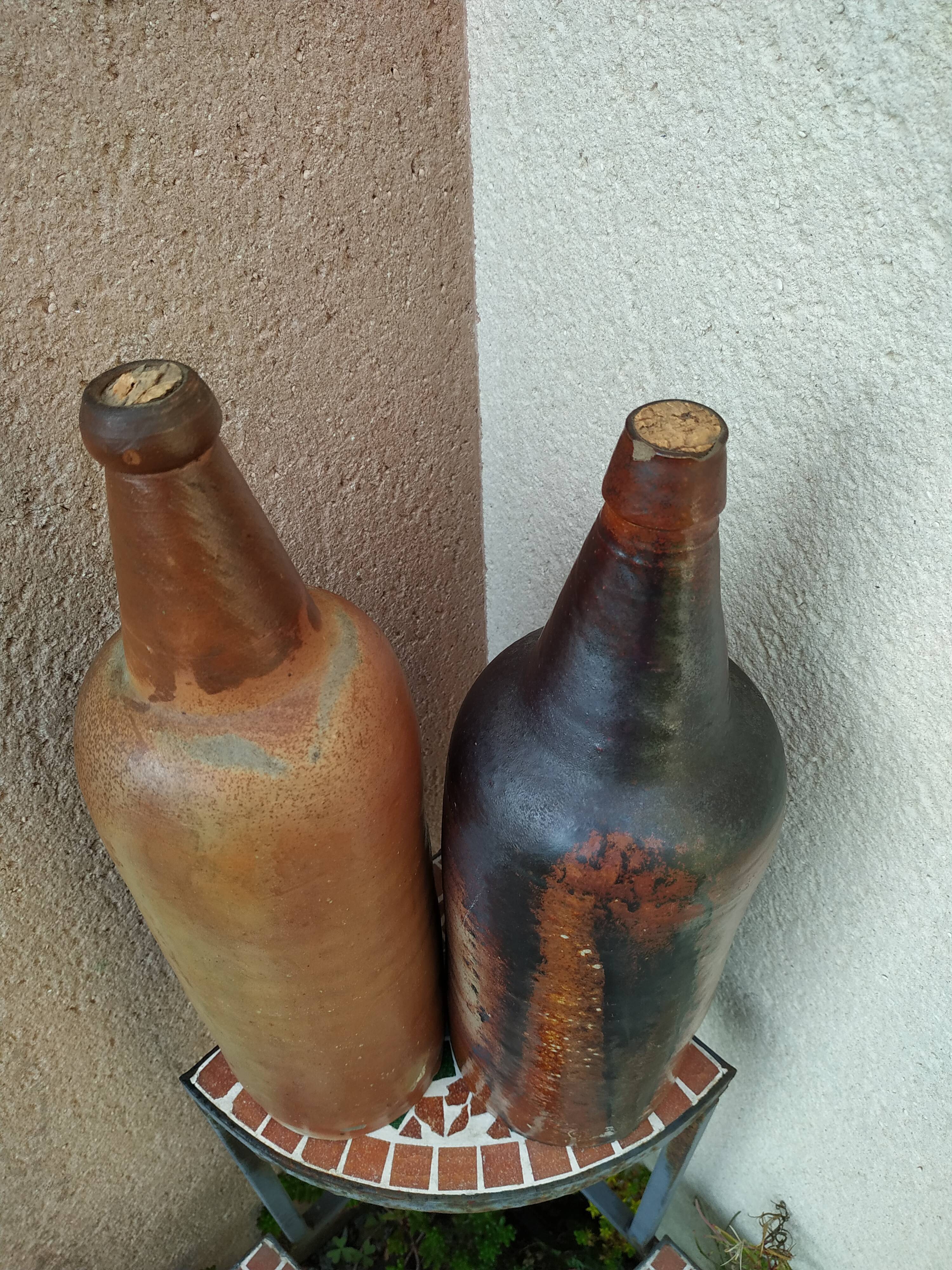 Pair of bottles in 19th century breton sandstone