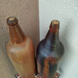 Pair of bottles in 19th century breton sandstone