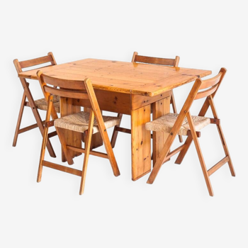 Table et 4 chaises pliantes en bois de pin et hêtre. Conception rationaliste. Vintage. France, 70's