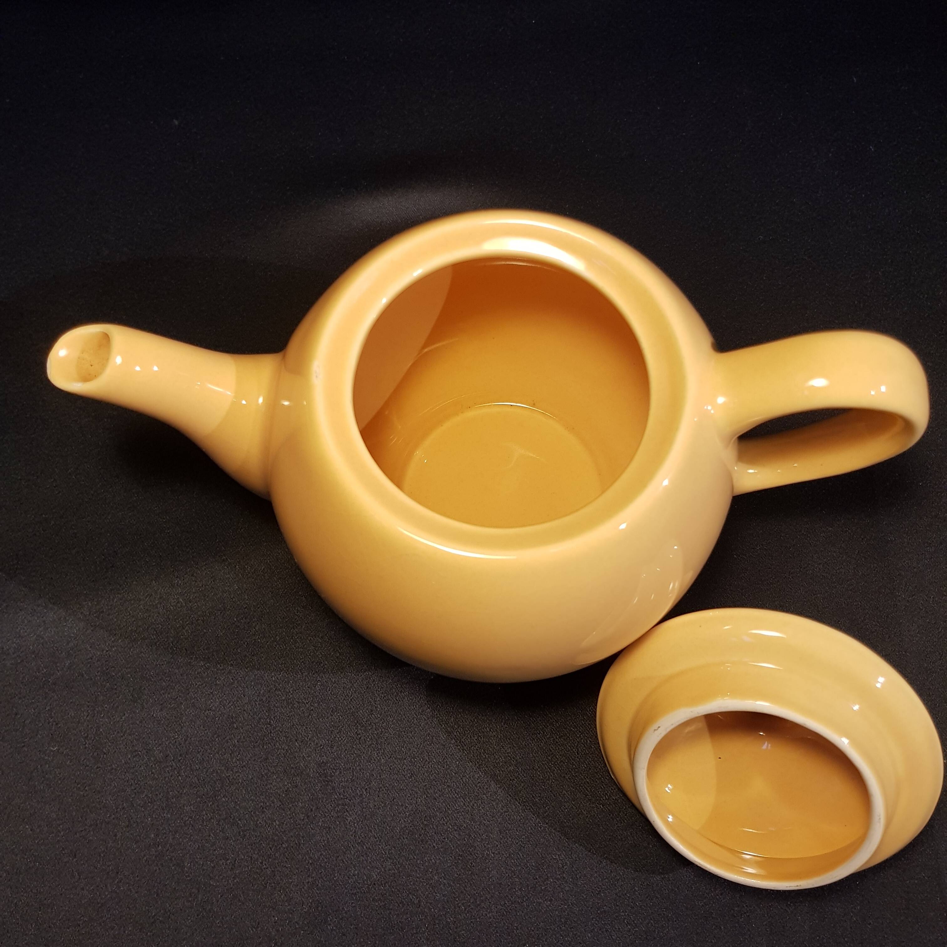 Yellow ceramic teapot