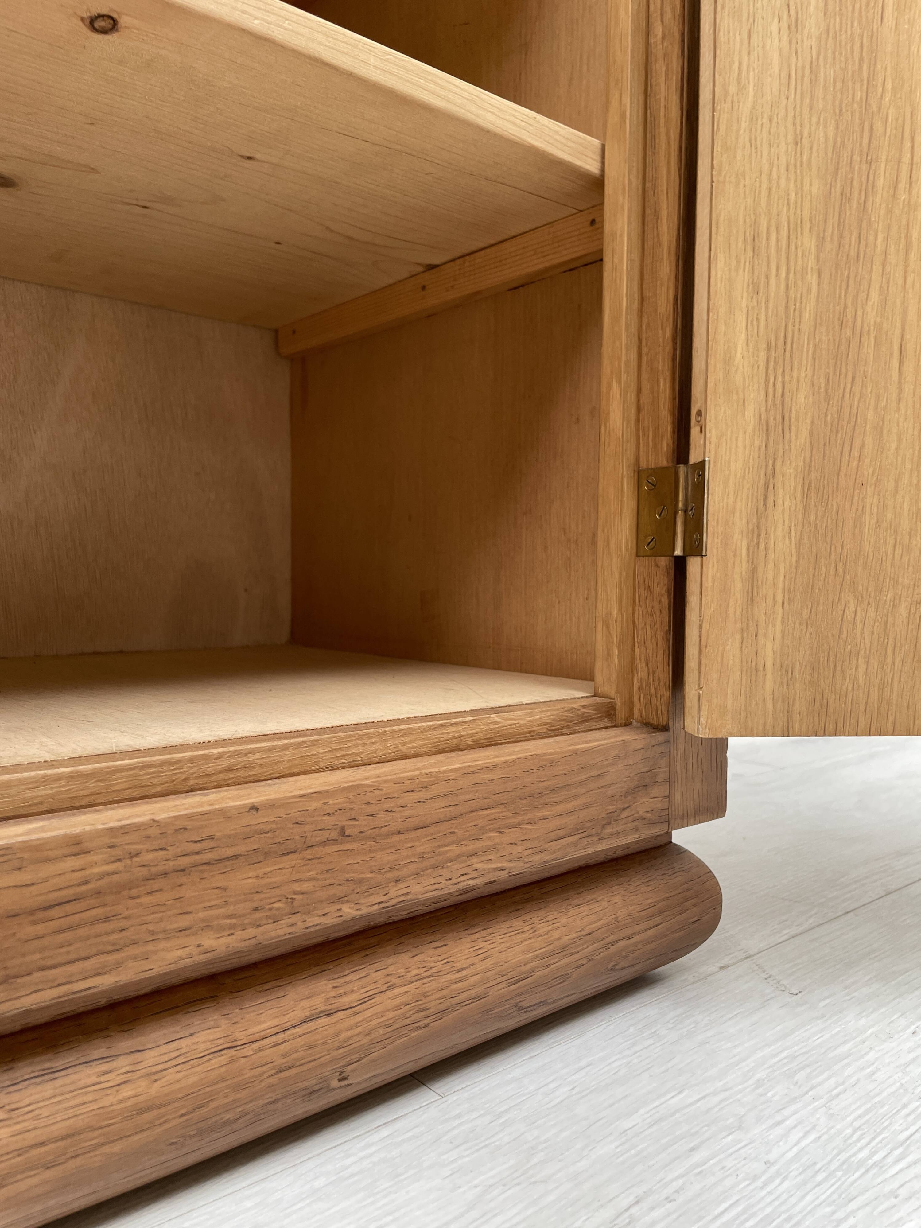 Storage unit in solid oak and veneer, circa 1960.