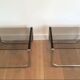 Pair of side tables in chrome, blackened wood and glass.