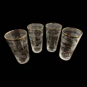 Four engraved crystal glasses from La Granja, with gilded edges, early 20th century.